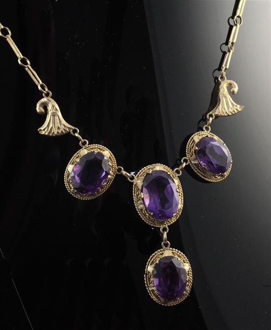 A gold and synthetic colour change corundum drop necklace, necklace 20in.